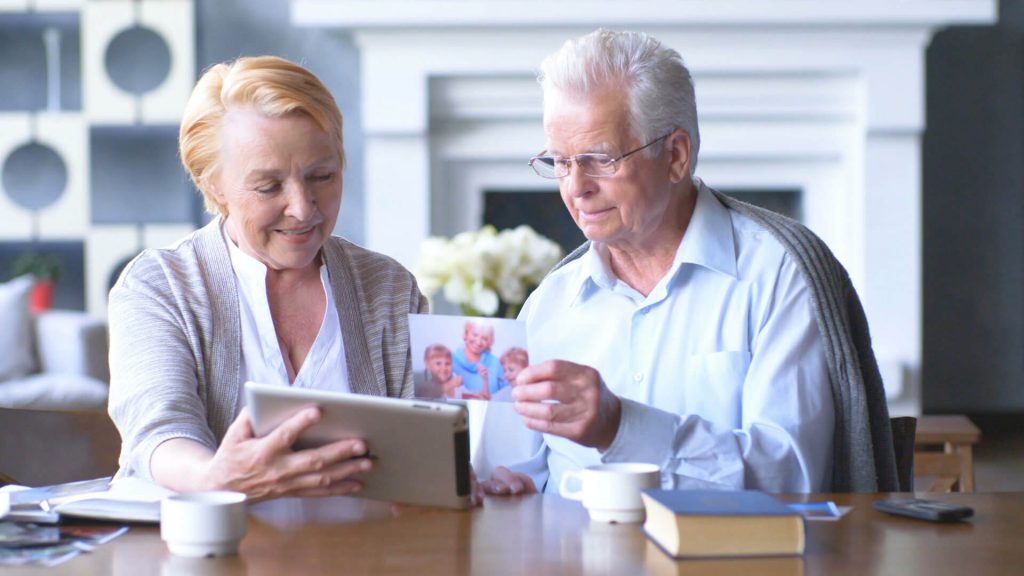 ipad elderly watching youtube and facebook