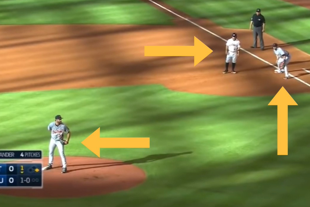 View of high third camera capturing pick off play