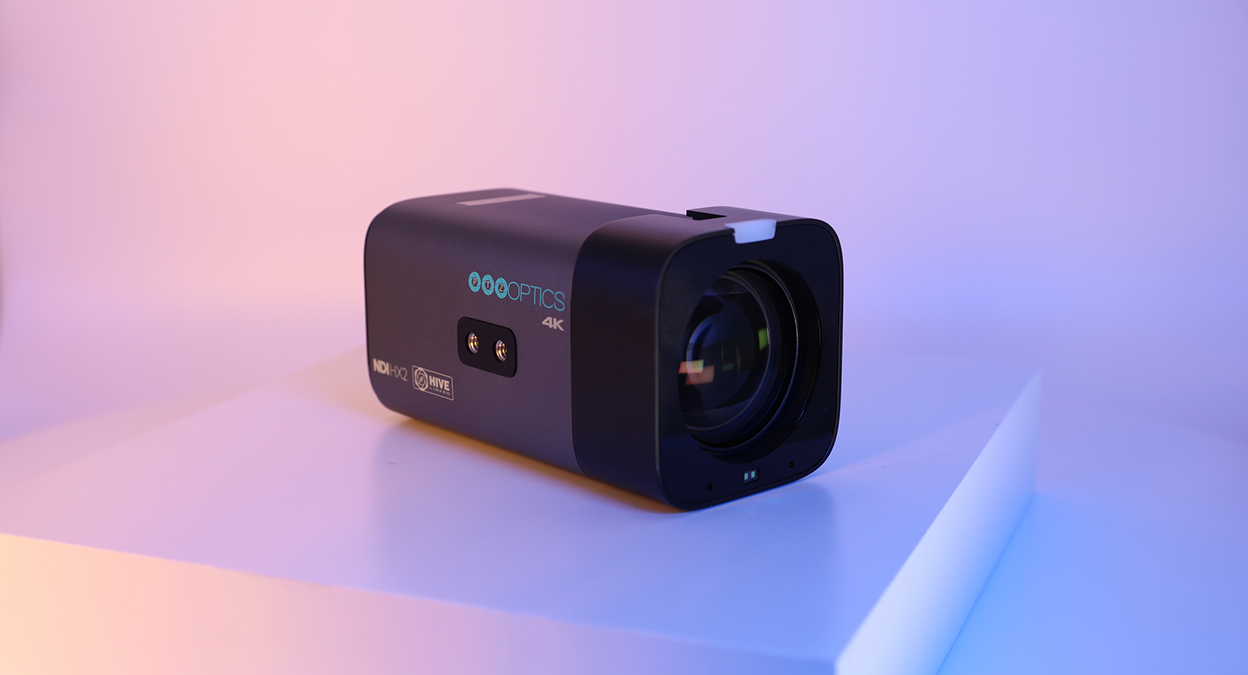 PTZOptics Studio 4K camera on pink gradient background